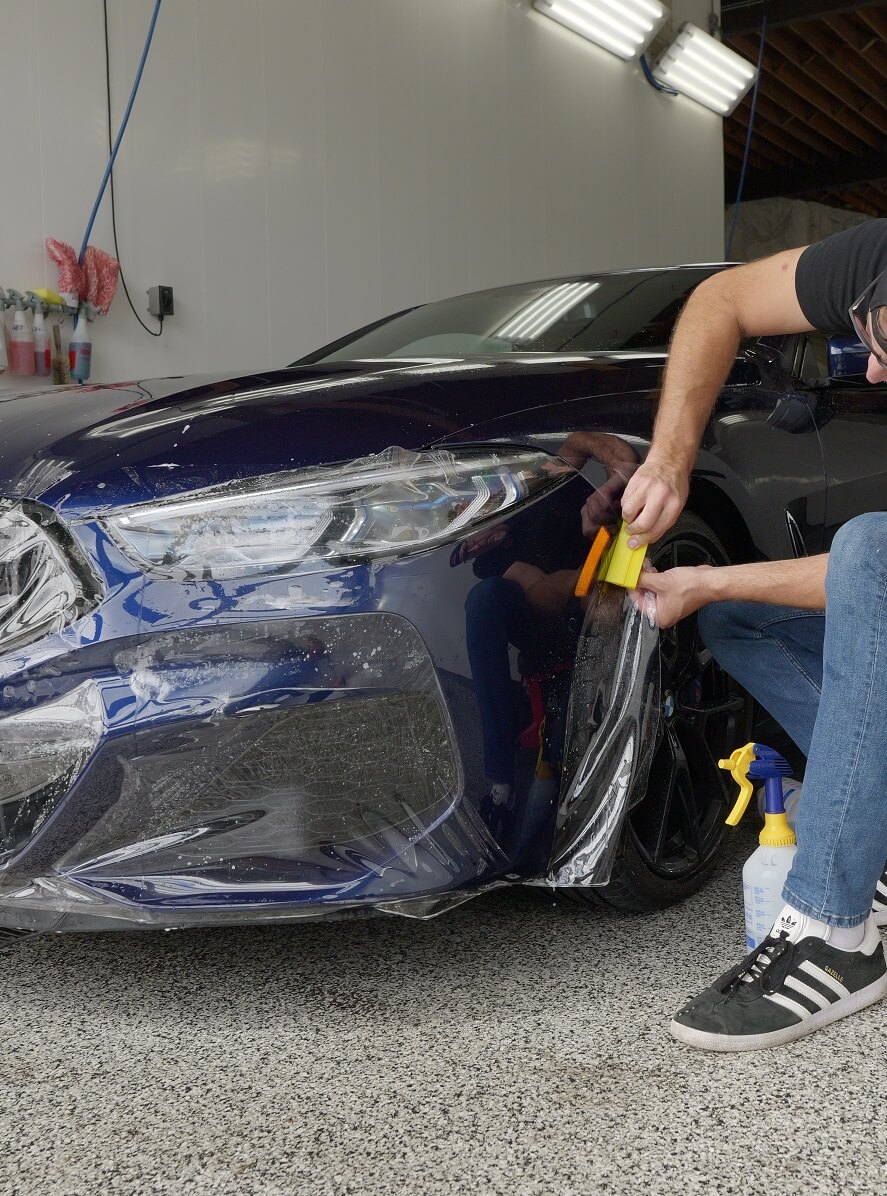 ppf install PPF being installed on a bmw front bumper